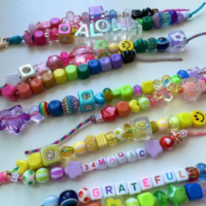 Key chains and charms made with beads and string