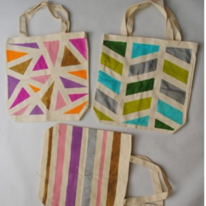 3 canvas tote bags with painted geometric designs