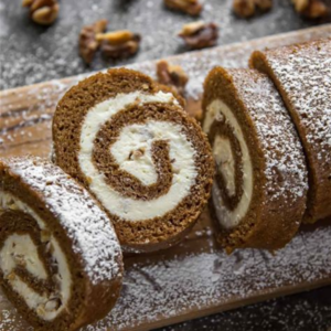 a piece of cake with gooey filling and topped with creamy filling